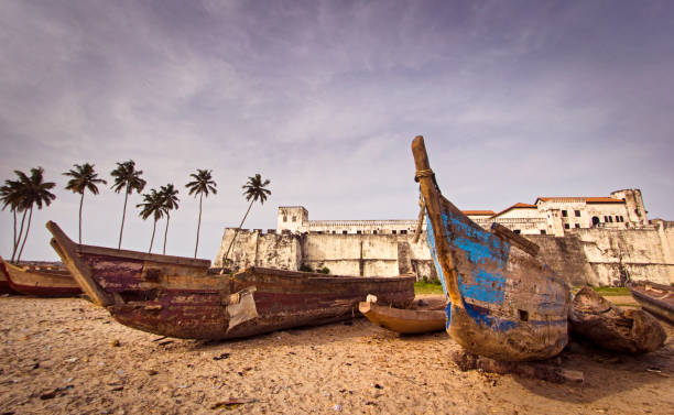 Fishing boats and Elmina Castle, Ghana